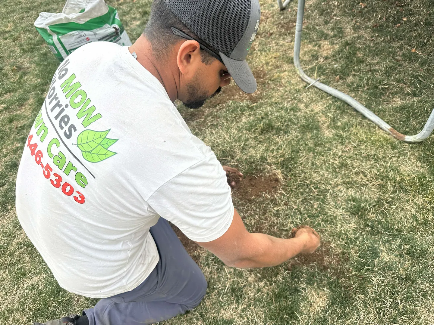 Sprinkler watering a residential lawn in Aurora, Colorado